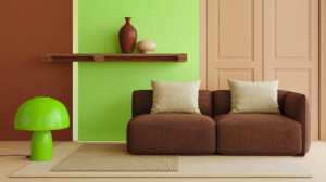 A cozy living room with a brown sectional sofa, a green lamp, and decorative vases on a wooden shelf.